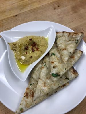 Garlic Naan Bites + Hummus from ADDA Sports Pub